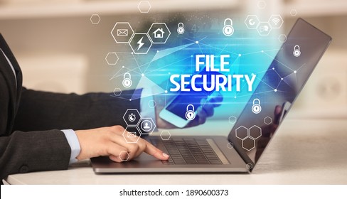 FILE SECURITY inscription on laptop, internet security and data protection concept, blockchain and cybersecurity - Shutterstock ID 1890600373
