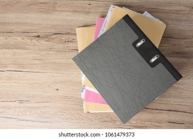 File Stack Top View, File Folder Pace On Wood Desk Background