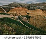 Filed and pattern on mountains at Badlands National Park.