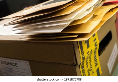 Files And Evidence Bag In A Crime Lab, Conceptual Image