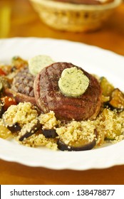 Filet Mignon With Herb Butter, Couscous And Vegetables