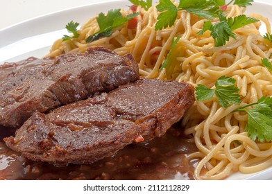 Filet Mignon With Spaghetti In Butter And Parsley.