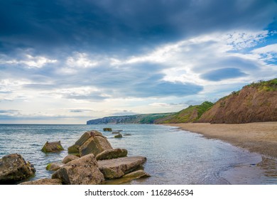 Filey bay Beach on Yorkshire coast near Reighton Gap and Speeton at sunrise - Shutterstock ID 1162846534