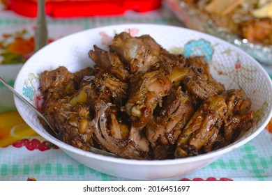 Fililipino Dish Adobong Native Manok. Native Chicken Adobo served on the table. Shallow Depth of Field. Selective Focus. 