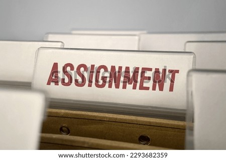 Filing folders with word ASSIGNMENT