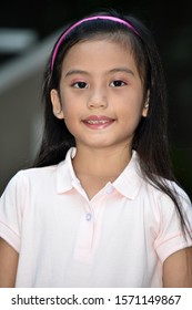 A Filipina Girl Child Smiling