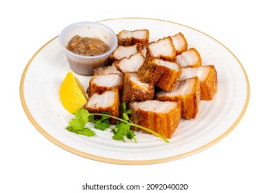 Filipino delicacy, Lechon Kawali, Crispy deep-fried pork belly snack isolated on white