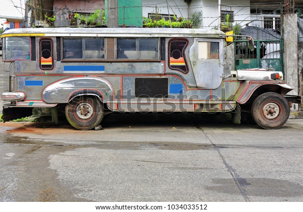 Filipino grey-silvery\
dyipni-jeepney. Public transport in Baguio town-originally made\
from US.military cars left over from WW.II locally altered-now from\
japanese surplus. Benguet\
province-Philippines