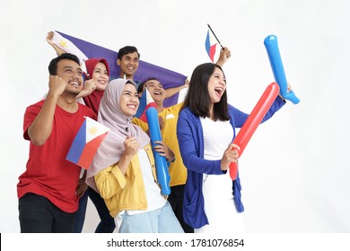 Filipino Group Of People Holding Philippines Flag Celebrating Independence Day