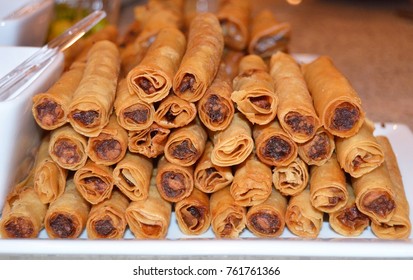 Filipino Lumpia Eggrolls On White Plate