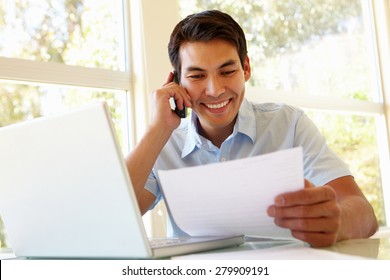 Filipino Man Working At Home