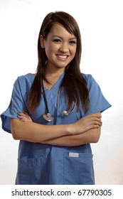 Filipino Nurse Doctor Working On Laptop Computer