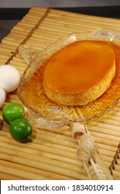 Filipino Style Crème Caramel (leche Flan) In Caramel Sauce Shown With Ingredients