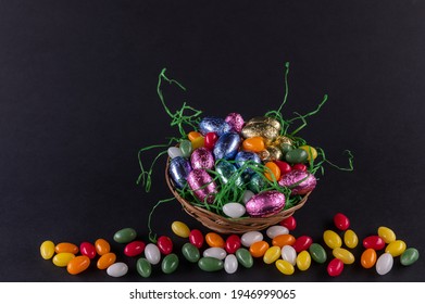 A Filled Easter Basket And Sweet Eggs