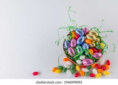 A Filled Easter Basket And Sweet Eggs