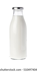 Filled Glass Bottle With Milk Isolated On White.