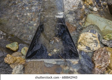  A Filled Sluice Box In The Drift Of A River