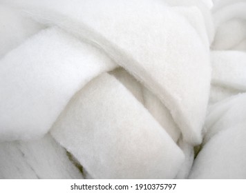 Filler for the production of pillows, blankets, bed mattresses. Sintepon, artificial down, siliconized fiber for light industry and garment production of home textiles - Shutterstock ID 1910375797
