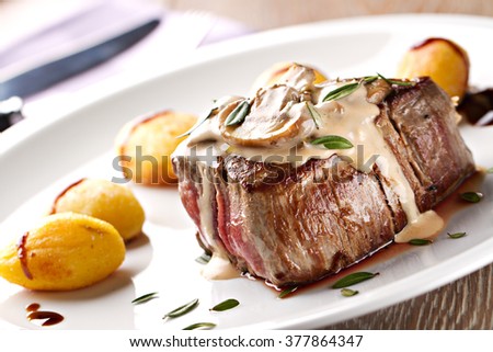 Fillet of beef with mushroom sauce and potatoes