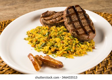 Fillet Mignon Grilled On Plate With Crumbs And Bacon