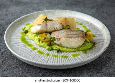 Fillet Of White Fish Grilled Or Steamed With Spinach Puree. Diet Nutritious Meal. Ready Menu For The Restaurant. Neutral Gray Blue Textured Background