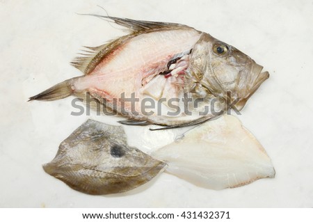 Similar – Image, Stock Photo Raw John Dory fish in metal tray