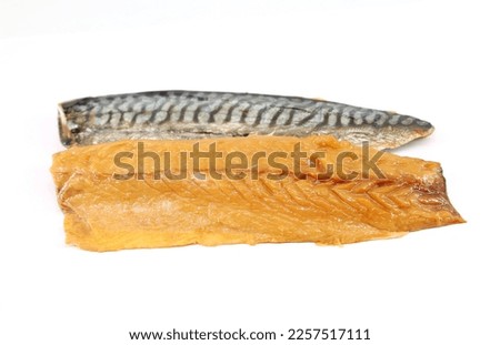 Fillets of smoked mackerel on white background.