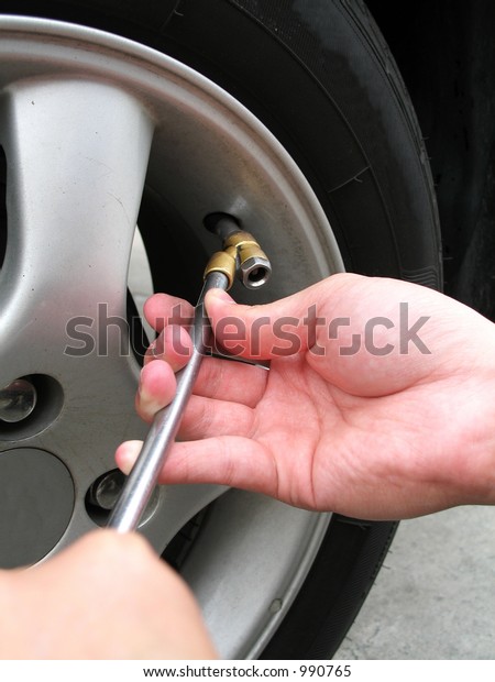 Filling Air Into Car\
Tyre