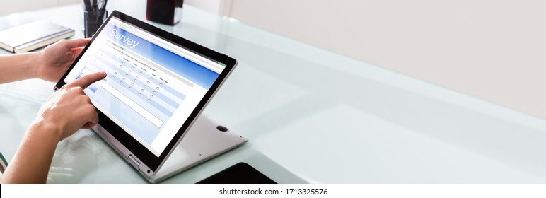 Filling Digital Survey Form On Laptop Screen - Shutterstock ID 1713325576