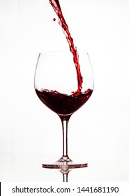 Filling The Glass With Wine. When Pouring A Red Wine, Fill Up The Glass A Third Of The Way To Allow For Aeration. Enjoying Wine Without Pretense. Pouring Wine Art.