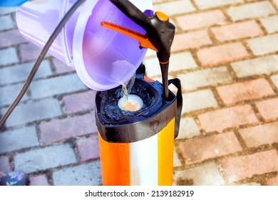 Filling the sprayer with liquid, close-up
