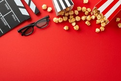 Film Buffs Unite: Top View Of Popcorn, 3D Glasses, And A Clapperboard On A Vibrant Red Background, Setting The Stage For A Memorable Movie Night With Friends