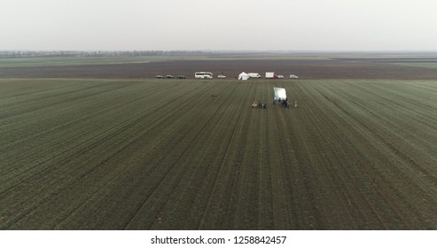 Film Crew Setting Up Scene In Crop Field Winter 06