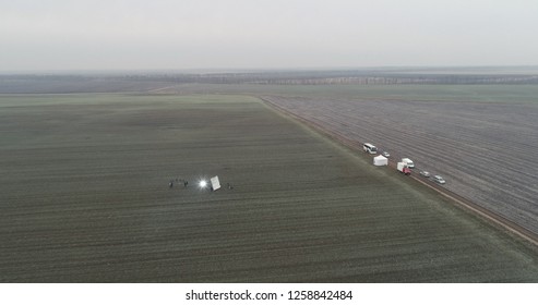 Film Crew Setting Up Scene In Crop Field Winter 