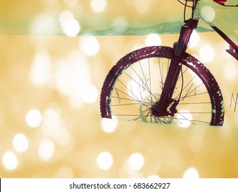 Film Grain Effect. The Front Wheel Of Mountain Bike Stay In Powder Snow. 