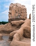 Film image showing repair work on Ancient Casa Grande Ruins National Monument of the Pre-columbian Hohokam native Americans in Arizona USA