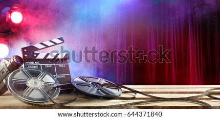 Film movie Background - Clapperboard And Film Reels In Theater
