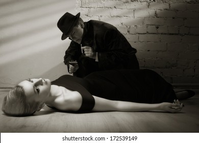 Film Noir. Detective Investigating The Crime Scene