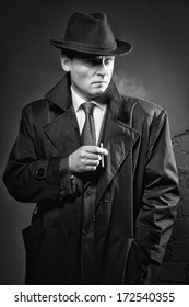 Film noir. Retro styled fashion portrait of a detective
