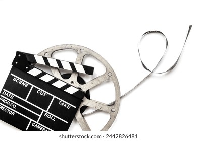 Film reels and clapperboard - cinema and filmmaker concept. - Powered by Shutterstock