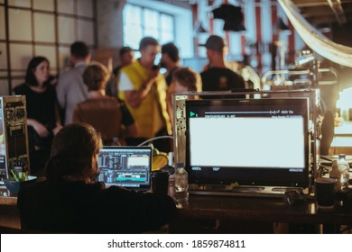 Film set, monitors and modern shooting equipment. Film crew, lighting devices, monitors, playbacks - filming equipment and a team of specialists in filming movies, advertising and TV series - Shutterstock ID 1859874811
