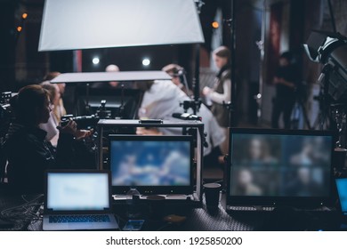 Film Set, Monitors And Modern Shooting Equipment. Film Crew, Lighting Devices, Monitors, Playbacks - Filming Equipment And A Team Of Specialists In Filming Movies, Advertising And TV Series