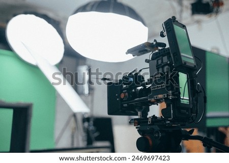 Film set, monitors and modern shooting equipment. Film crew, lighting devices, monitors, playbacks - filming equipment and a team of specialists in filming movies, advertising and TV series