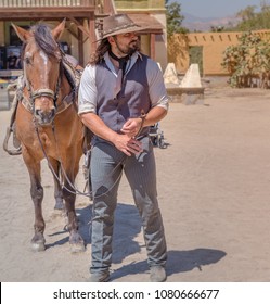 Film Specialist Doing Western Movie Scene