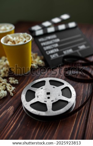 film strip on a wooden background. selective focus