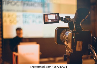 Filming Creative Video Footage With Professional Video Camera During The Lection Or Meeting