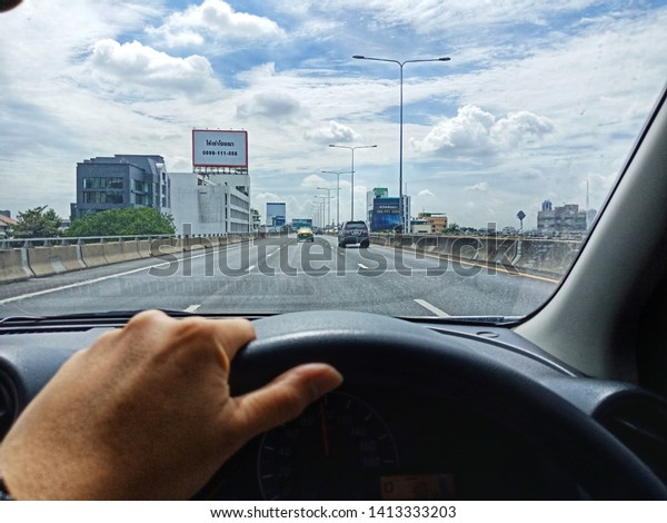 Filming Date 01-06-2019\
Nonthaburi Area - In Thailand The concept of the driver\'s view on\
the road