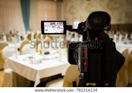 Filming of the event. Videography. Served tables in the Banquet hall.