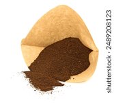 Filter bag with coffee grounds against a white background