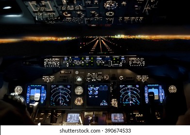 Final Approach At Night - Landing Of A Jet Airliner, View From The Cockpit